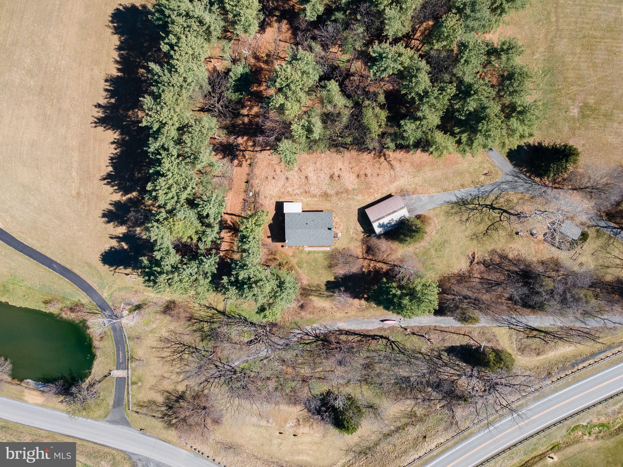 6794 Ottobine Road Dayton, VA 22821 - Photo 31 of 32 an aerial view of a house with a yard