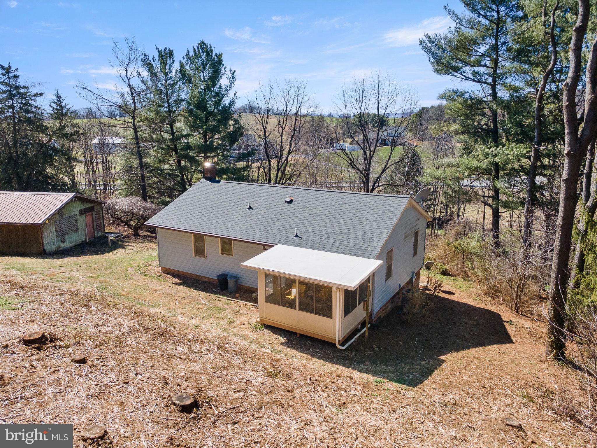 6794 Ottobine Road Dayton, VA 22821 - Photo 6 of 32 a view of a house with a yard and sitting area