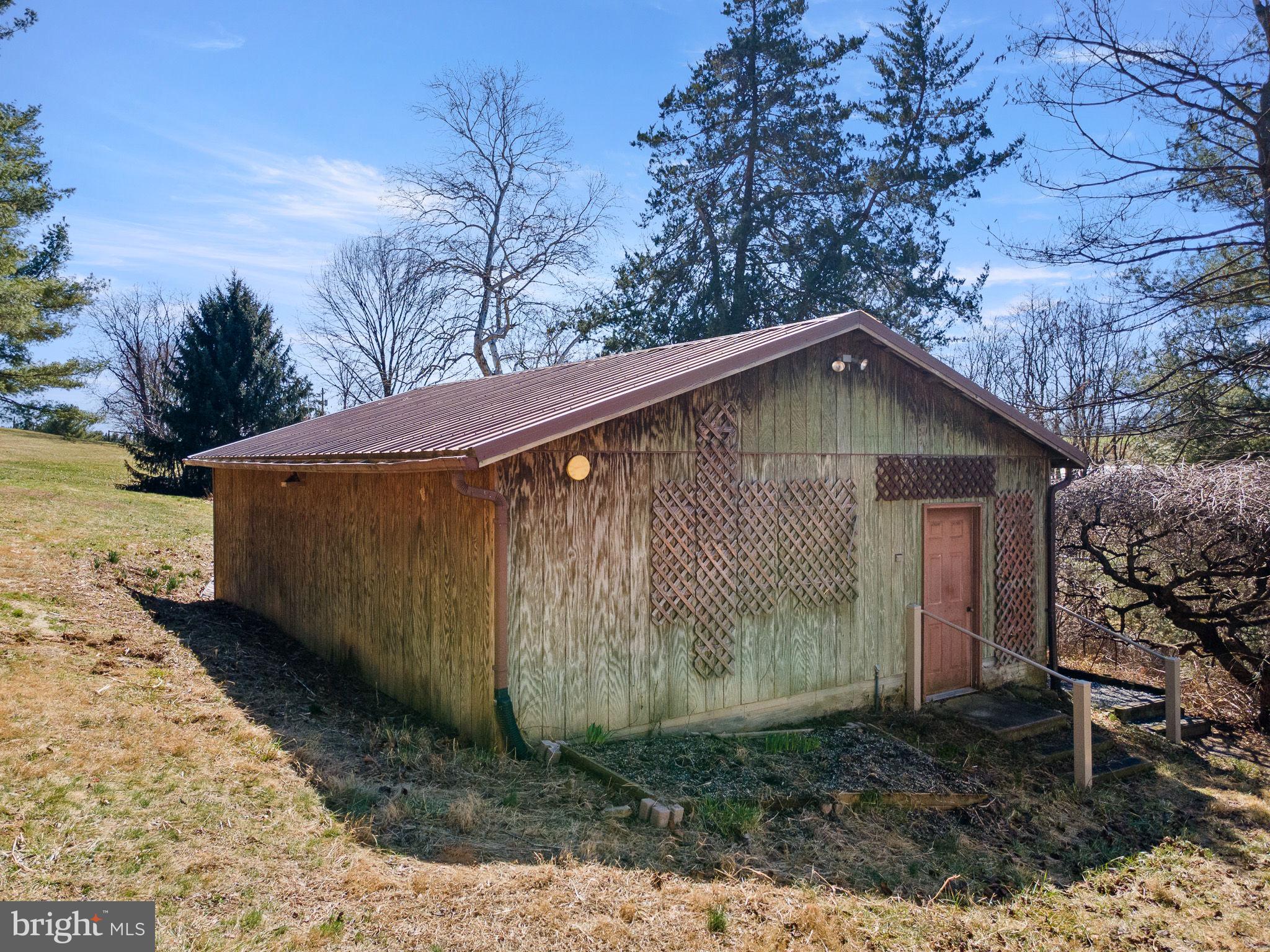 6794 Ottobine Road Dayton, VA 22821 - Photo 7 of 32 a backyard of a house with lots of green space