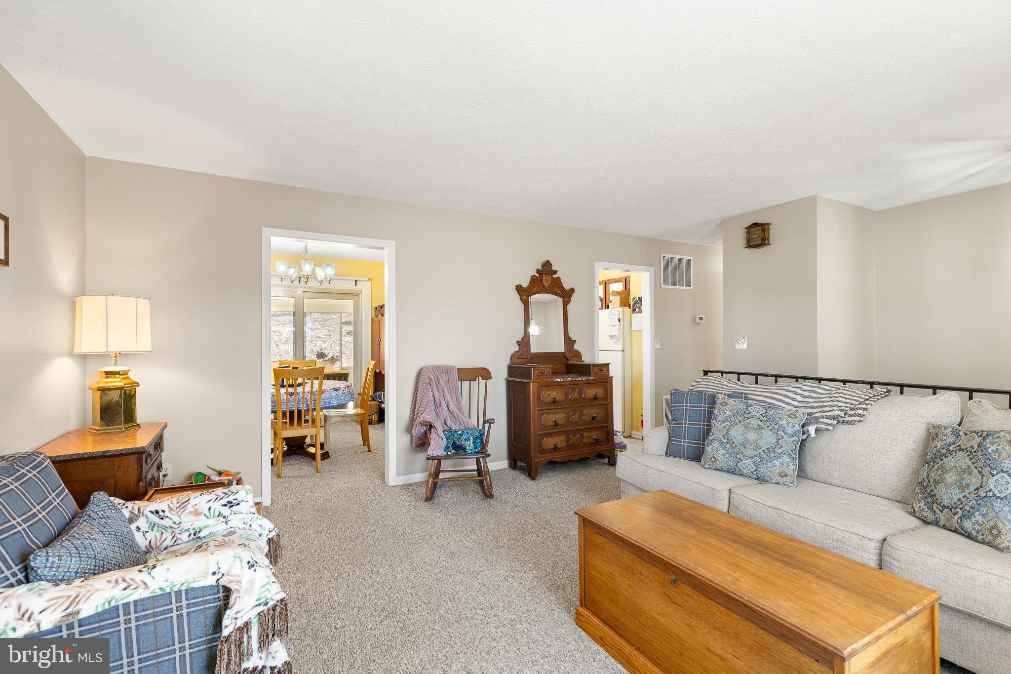 6794 Ottobine Road Dayton, VA 22821 - Photo 9 of 32 a living room with furniture and a couch
