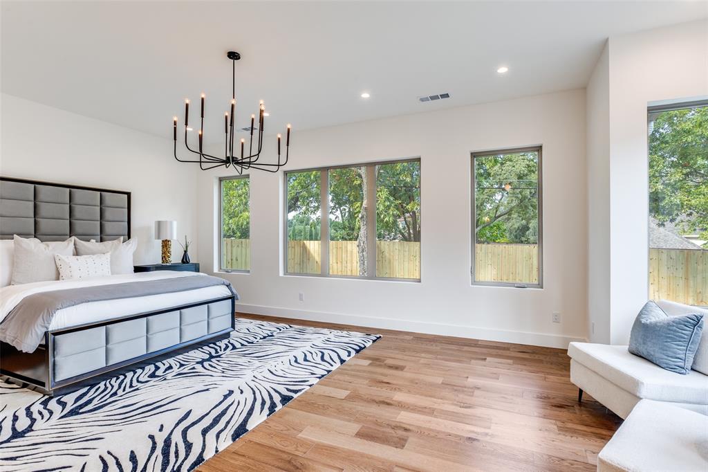 11131 Hillcrest Road Dallas, TX 75230 - Photo 11 of 24 a view of a bedroom with furniture window and outside view