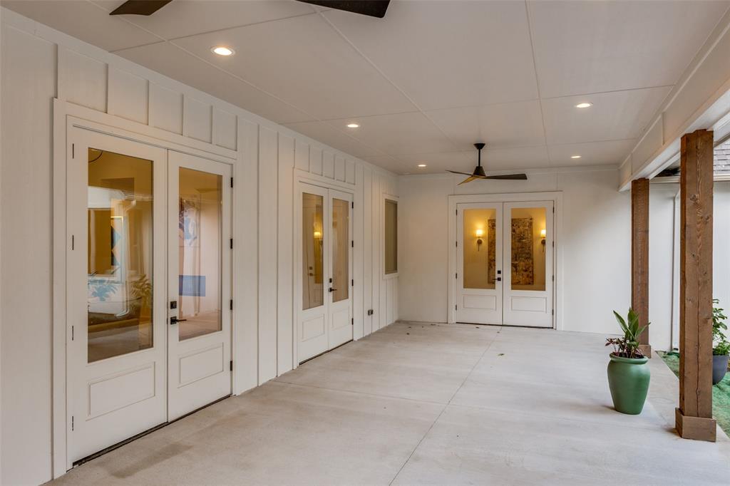11131 Hillcrest Road Dallas, TX 75230 - Photo 21 of 24 a view of empty room with floor to ceiling window and natural light