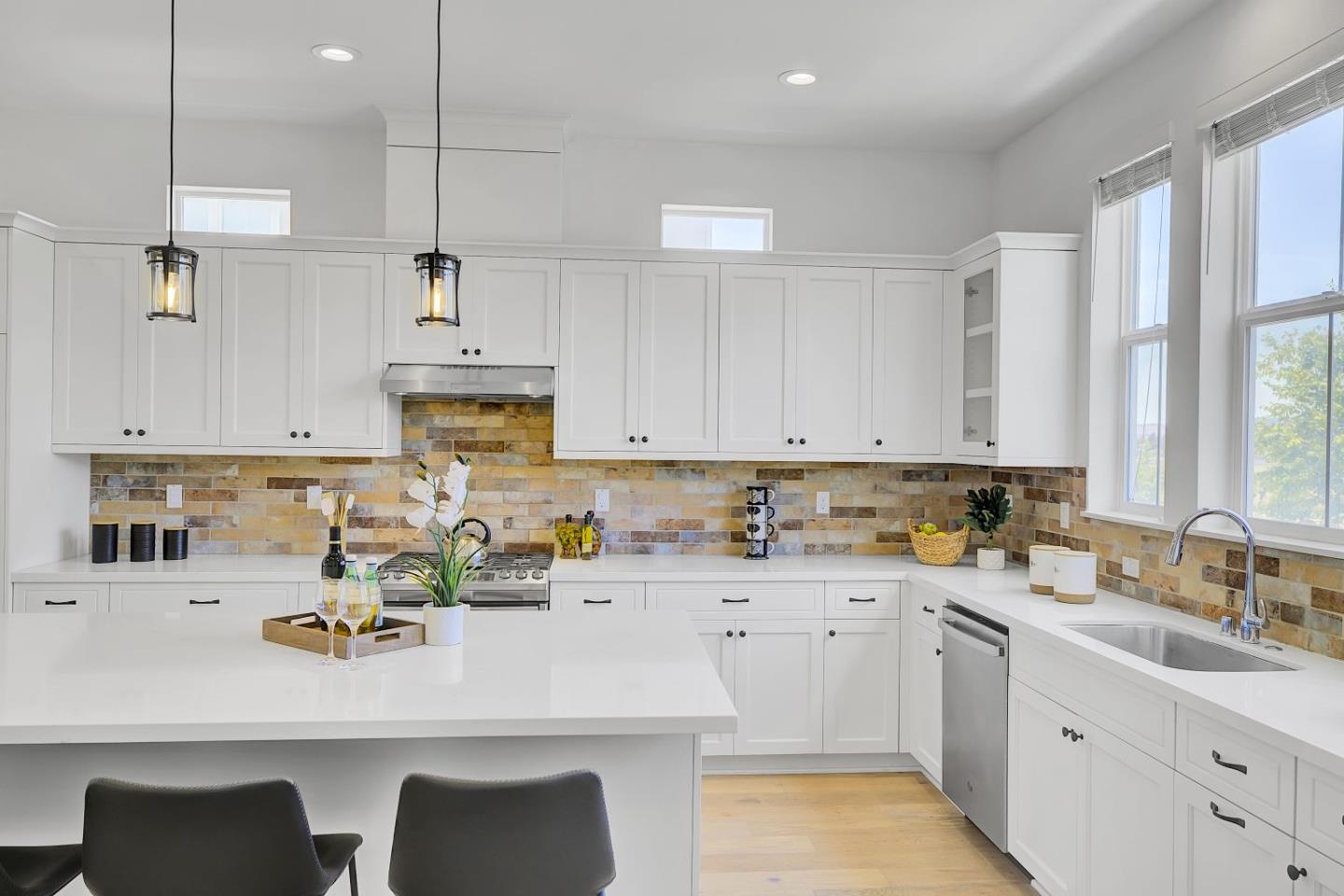 37356 Suncrest Street Newark, CA 94560 - Photo 16 of 47 a kitchen with a sink cabinets and window