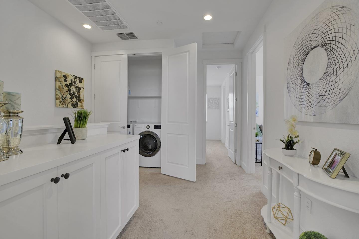 37356 Suncrest Street Newark, CA 94560 - Photo 21 of 47 a bathroom with a sink and mirror