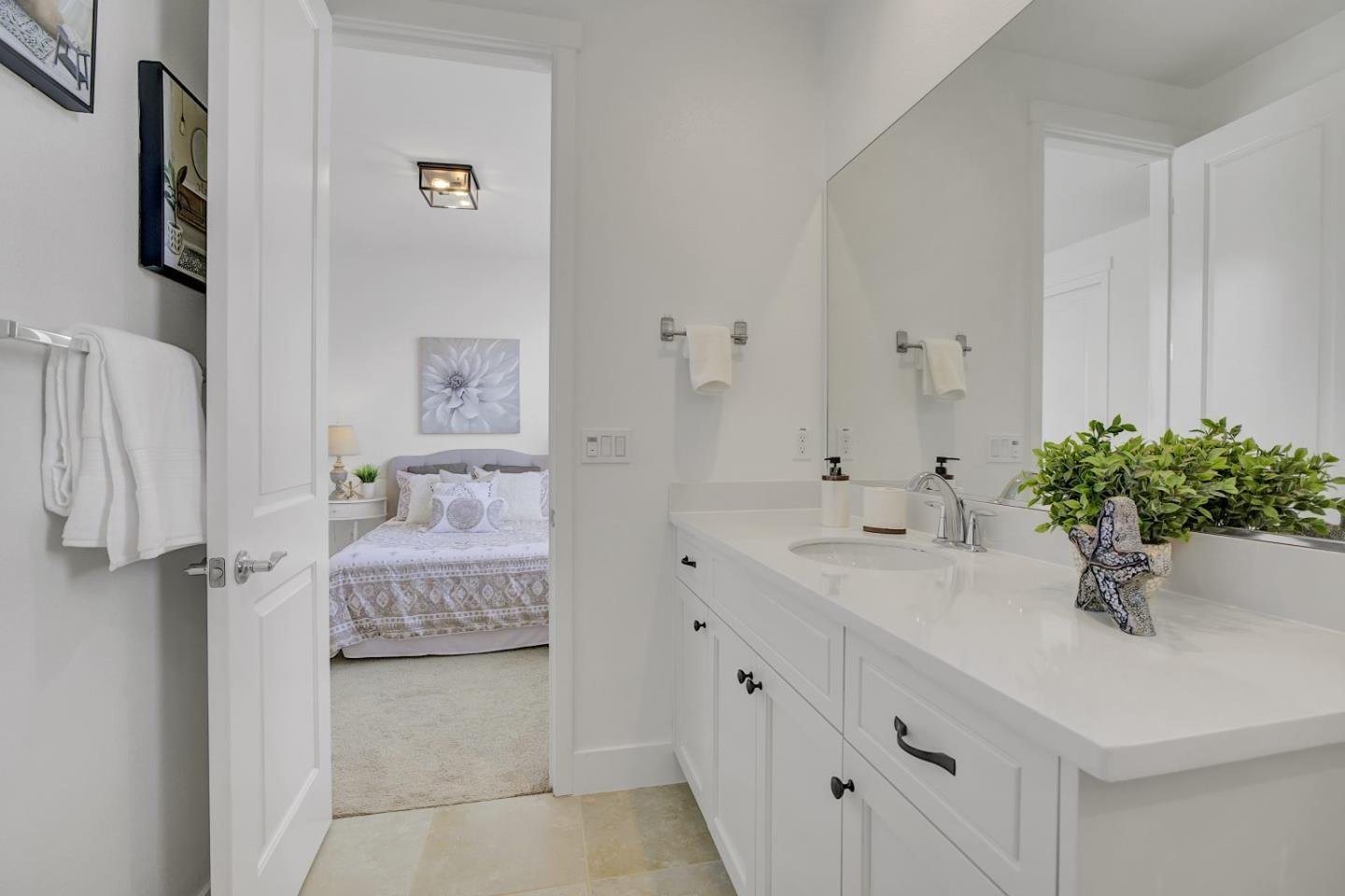 37356 Suncrest Street Newark, CA 94560 - Photo 29 of 47 a bathroom with a sink a tub and a mirror
