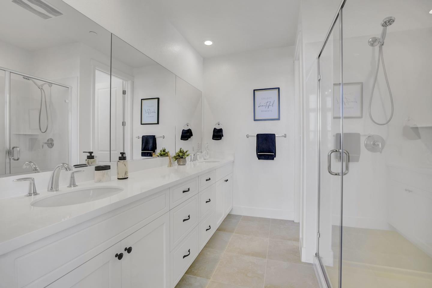 37356 Suncrest Street Newark, CA 94560 - Photo 34 of 47 a bathroom with a double vanity sink mirror and shower