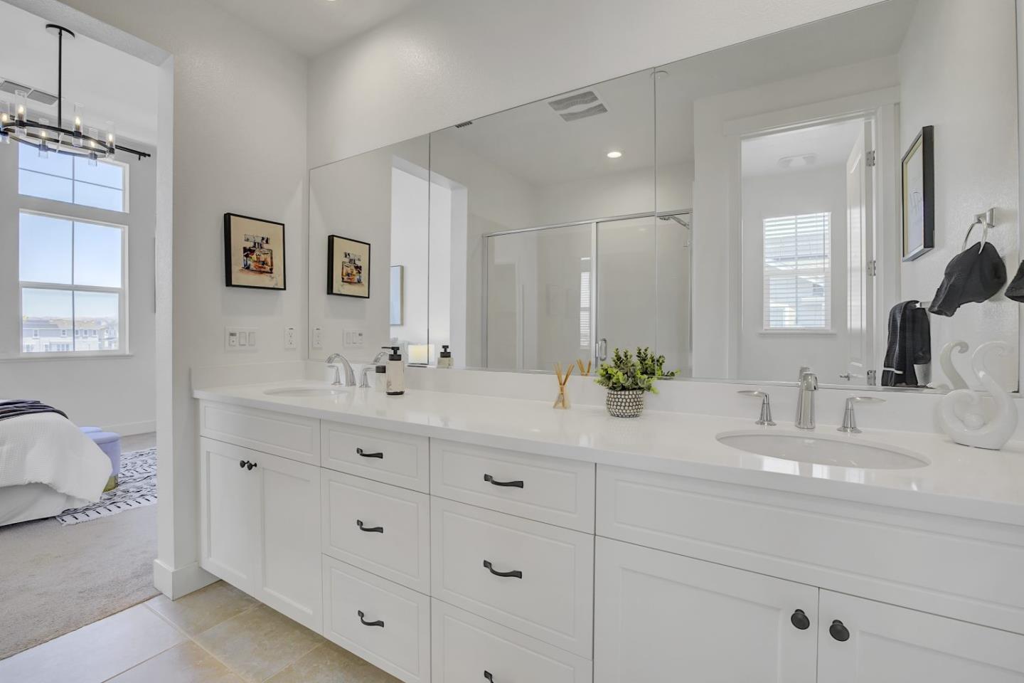 37356 Suncrest Street Newark, CA 94560 - Photo 36 of 47 a bathroom with double sink and a mirror