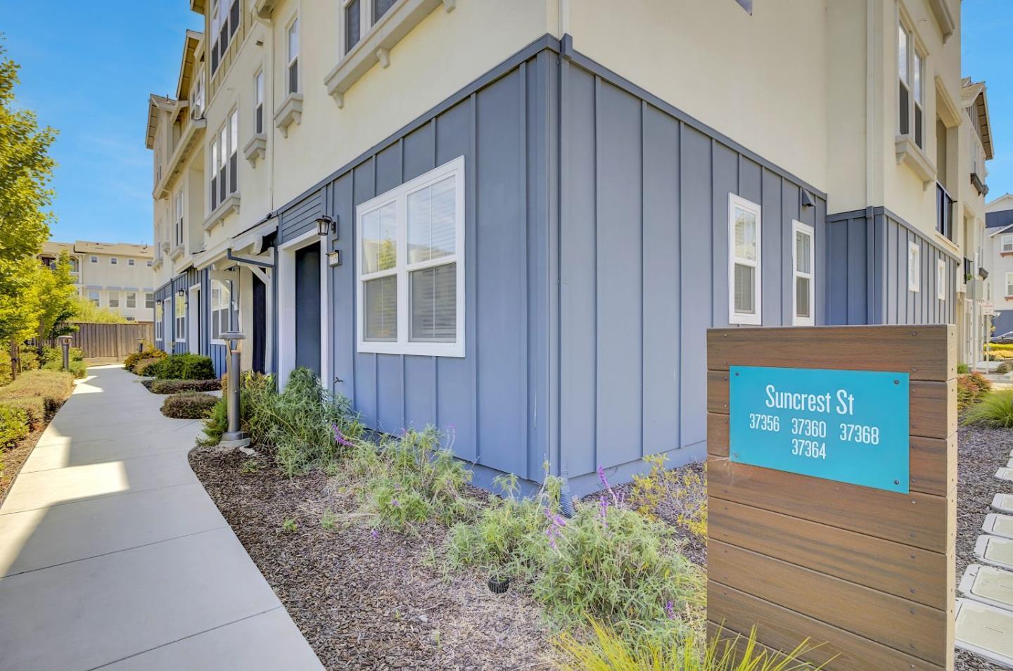 37356 Suncrest Street Newark, CA 94560 - Photo 39 of 47 a view of a street with potted plants