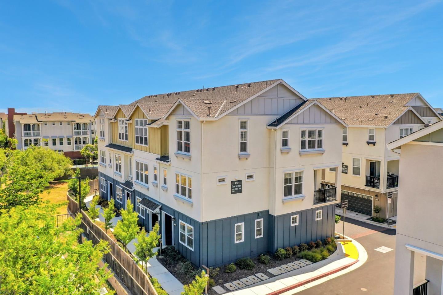 37356 Suncrest Street Newark, CA 94560 - Photo 42 of 47 a view of a big building with a big yard and large trees