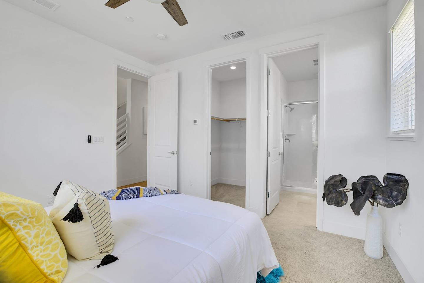 37356 Suncrest Street Newark, CA 94560 - Photo 7 of 47 a bedroom with a bed and a chandelier