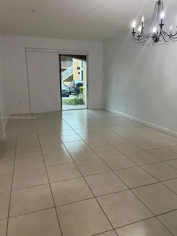 a view of livingroom with kitchen