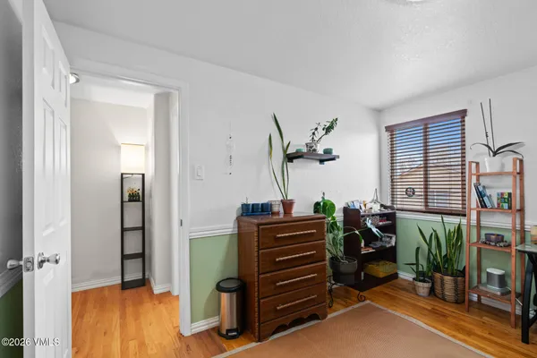 a view of workspace with furniture and windows
