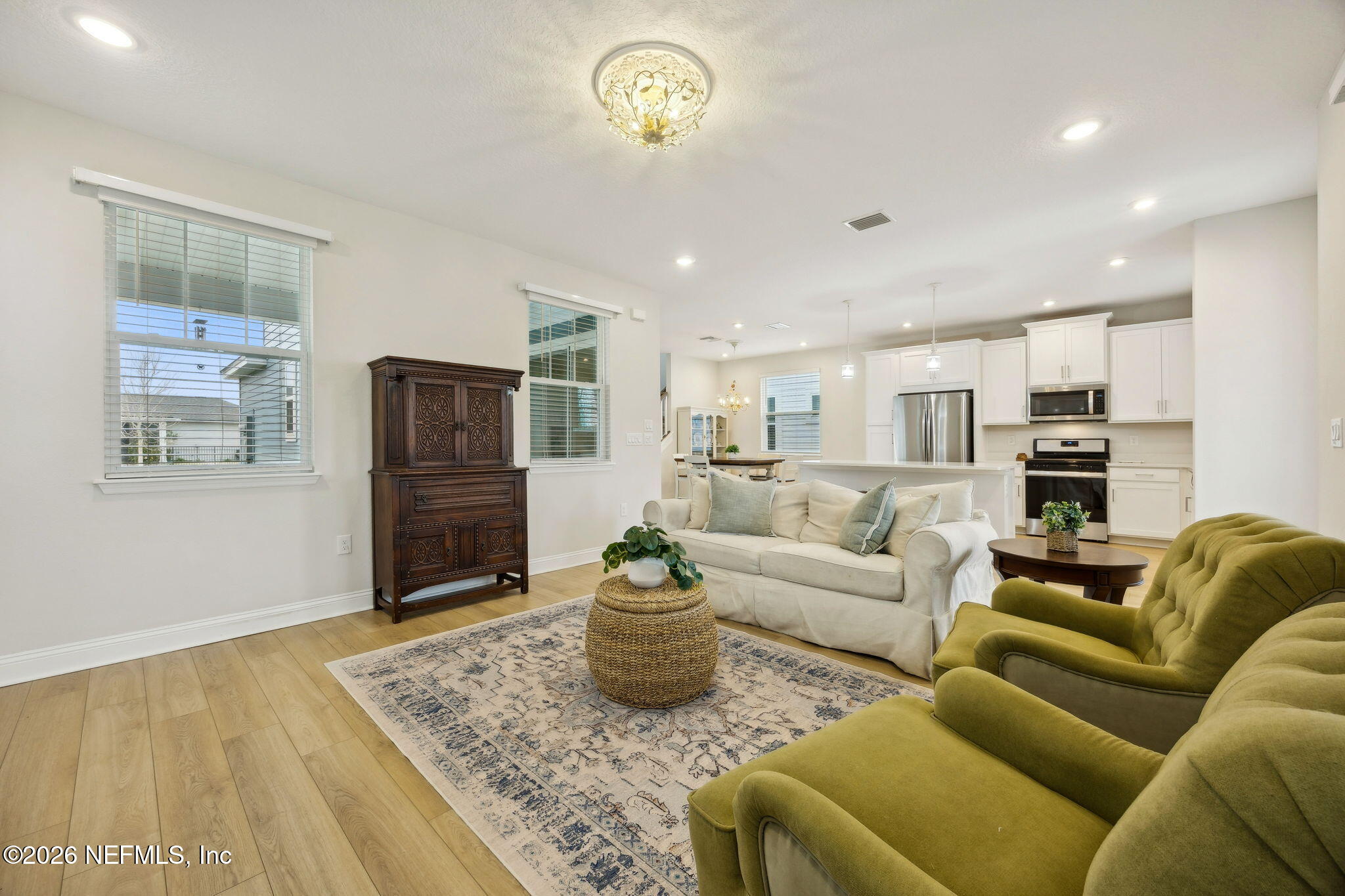 141 Redbud Lane Yulee, FL 32097 - Photo 12 of 77 a living room with furniture and a rug