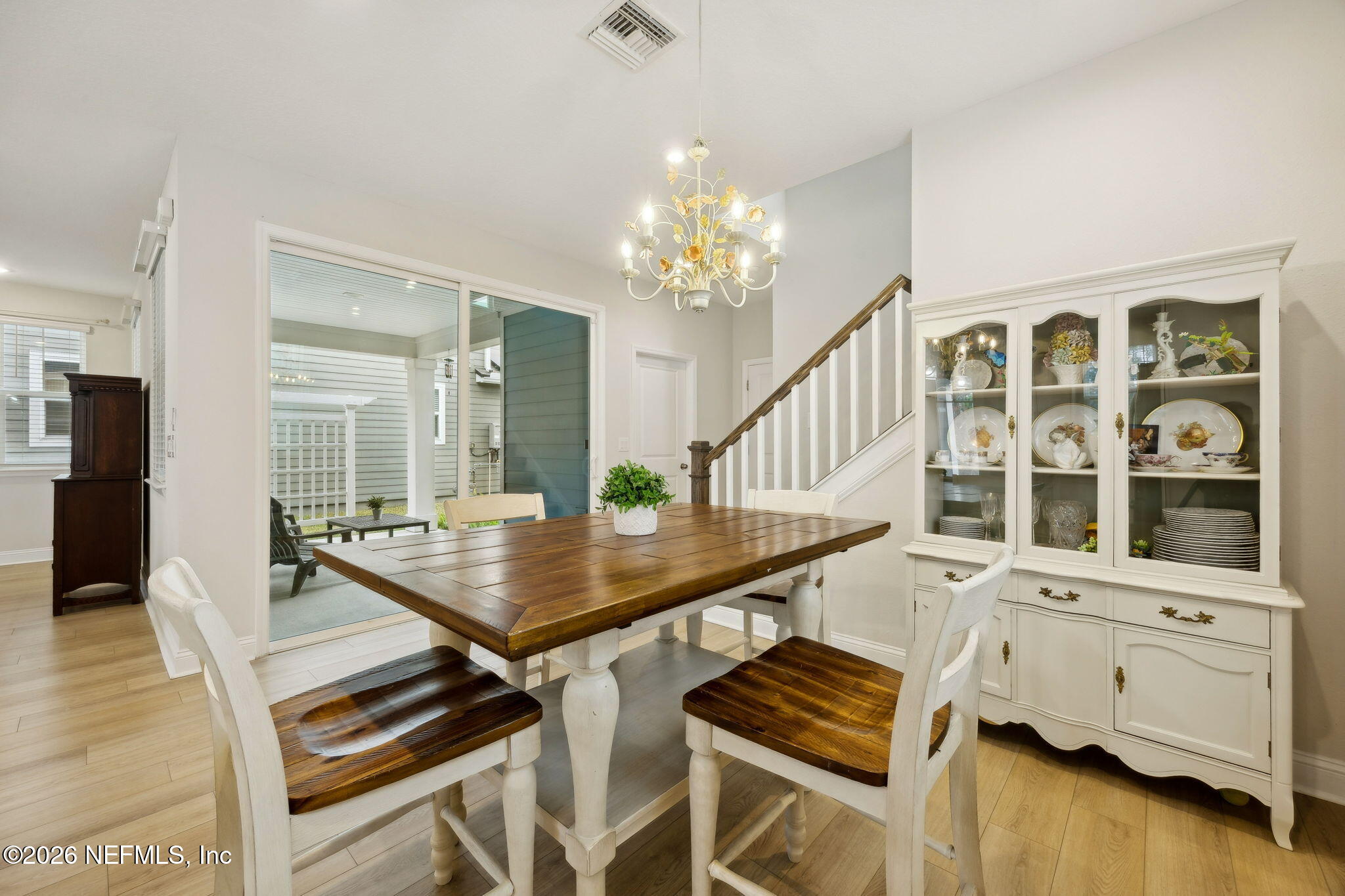141 Redbud Lane Yulee, FL 32097 - Photo 21 of 77 a view of a workspace with wooden floor and windows
