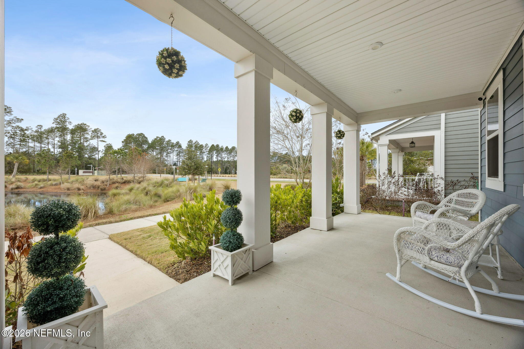 141 Redbud Lane Yulee, FL 32097 - Photo 4 of 77 a building outdoor space with seating space