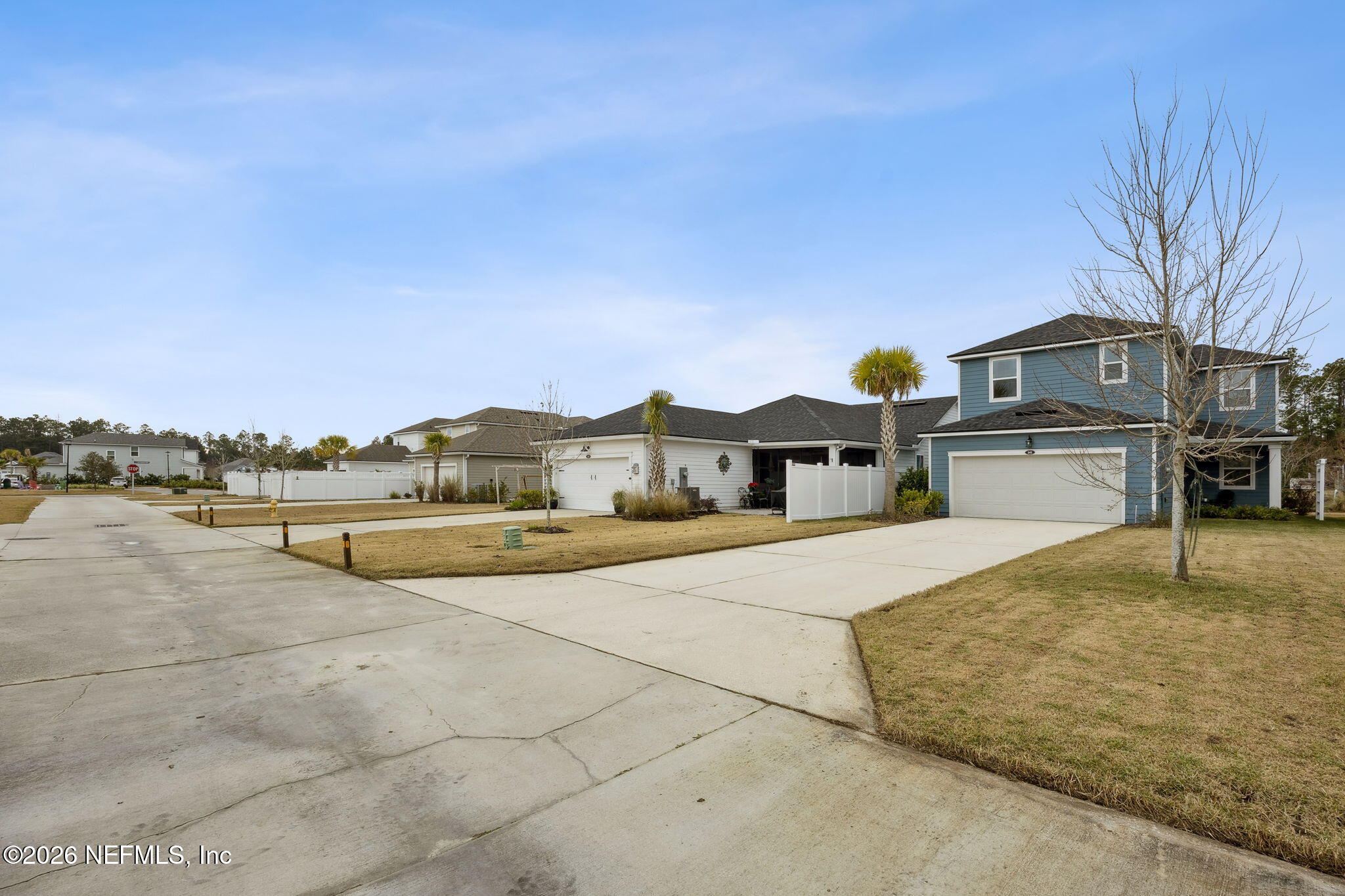 141 Redbud Lane Yulee, FL 32097 - Photo 50 of 77 a view of a house with a yard
