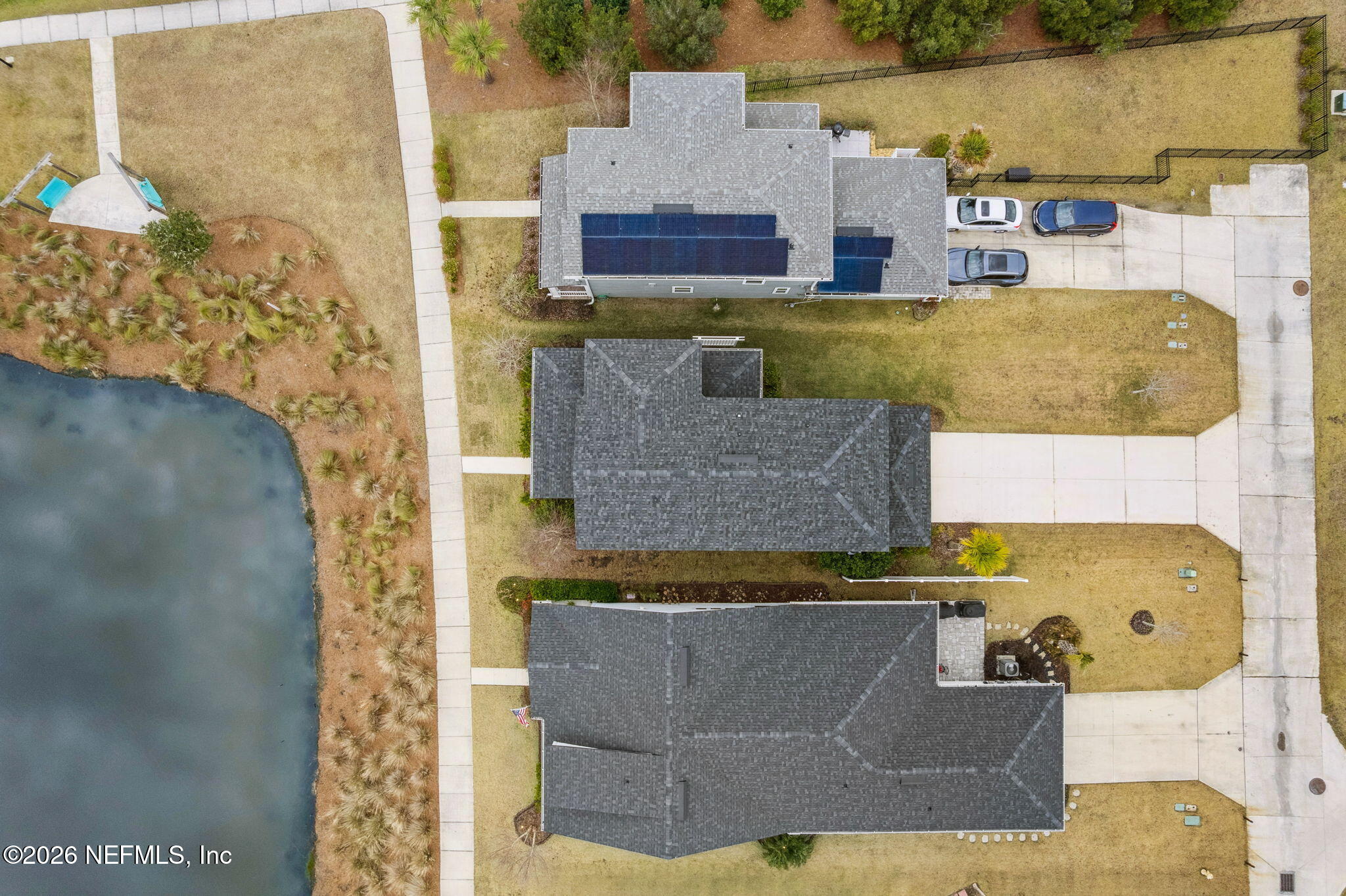 141 Redbud Lane Yulee, FL 32097 - Photo 51 of 77 an aerial view of residential houses with outdoor space