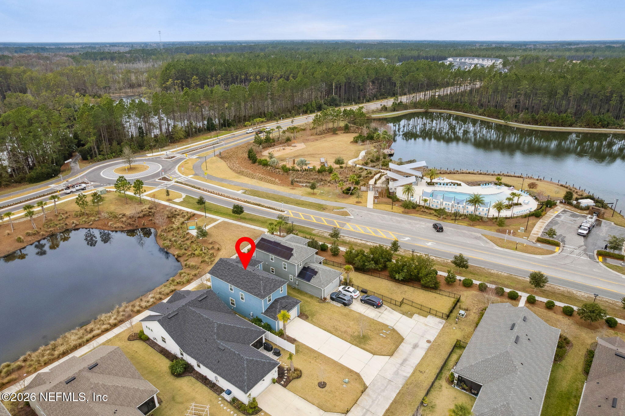 141 Redbud Lane Yulee, FL 32097 - Photo 53 of 77 an aerial view of a house with a lake view