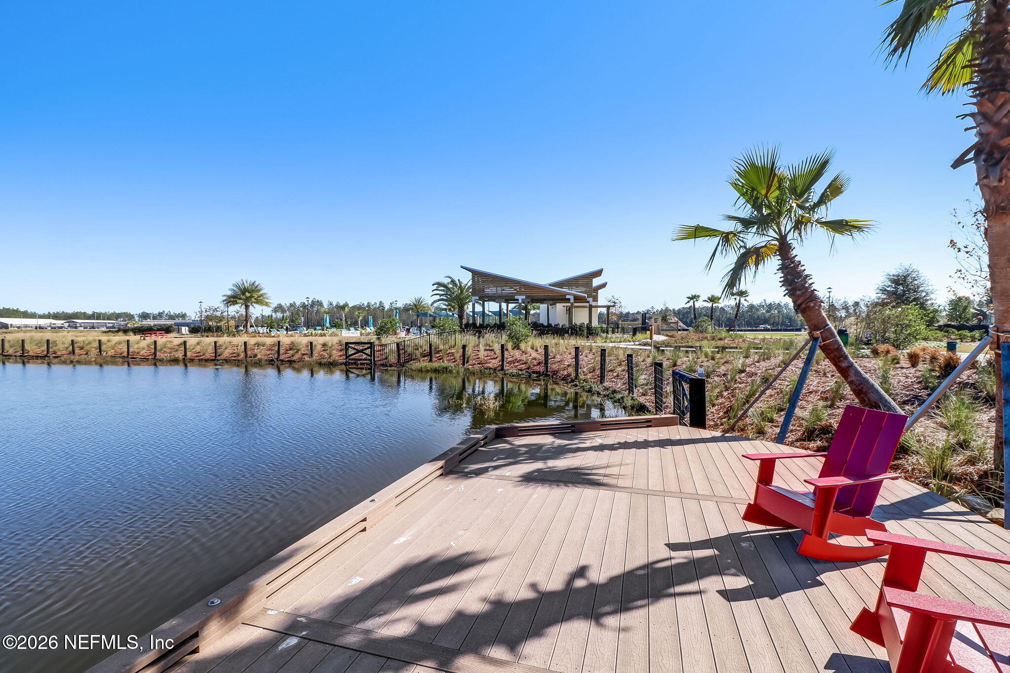 141 Redbud Lane Yulee, FL 32097 - Photo 61 of 77 a view of a lake with houses