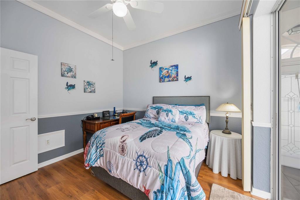 48 Bunker Road Rotonda West, FL 33947 - Photo 32 of 59 a bedroom with bed and a window
