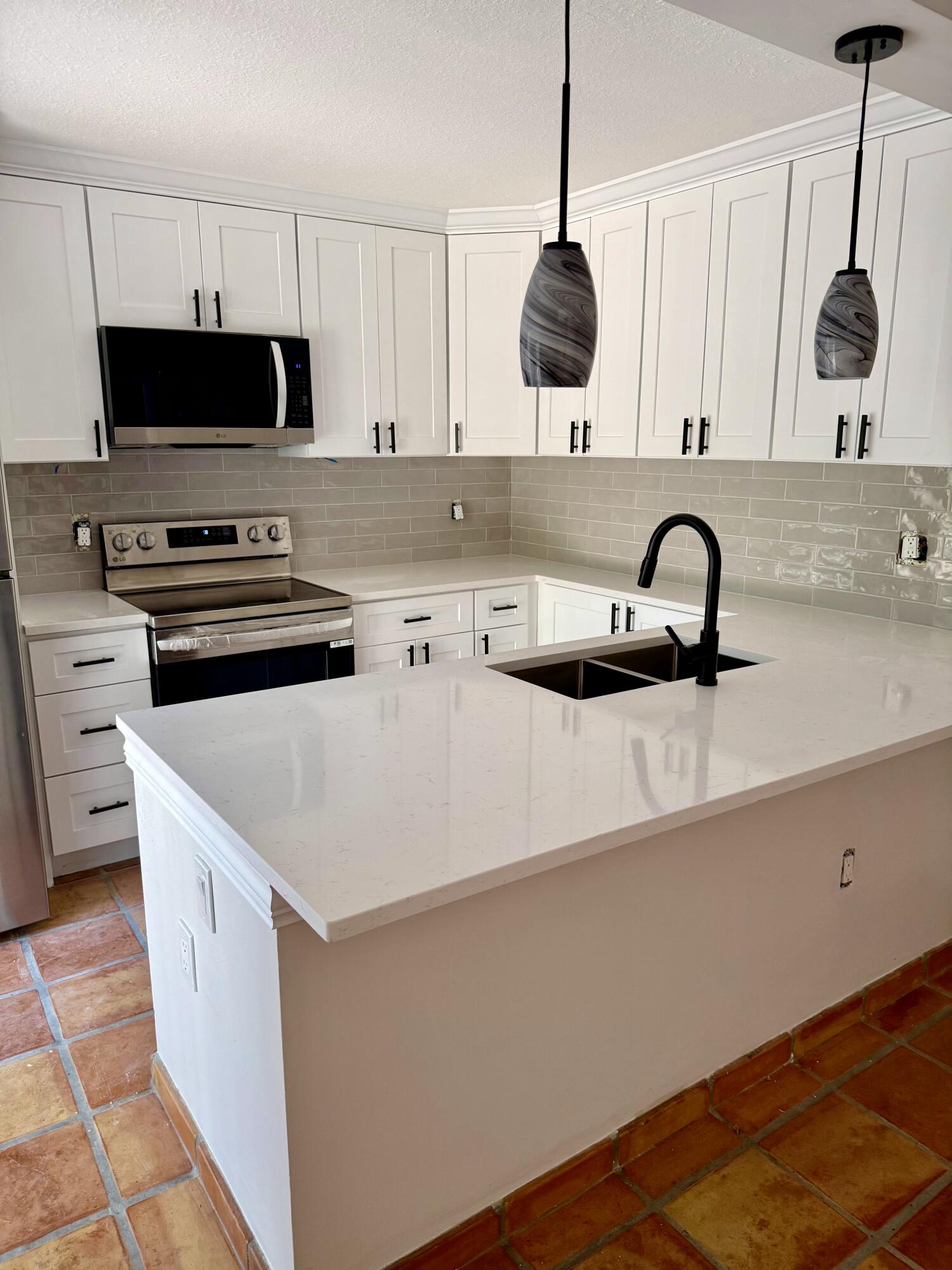 2431 24th Court Jupiter, FL 33477 - Photo 2 of 14 New Kitchen