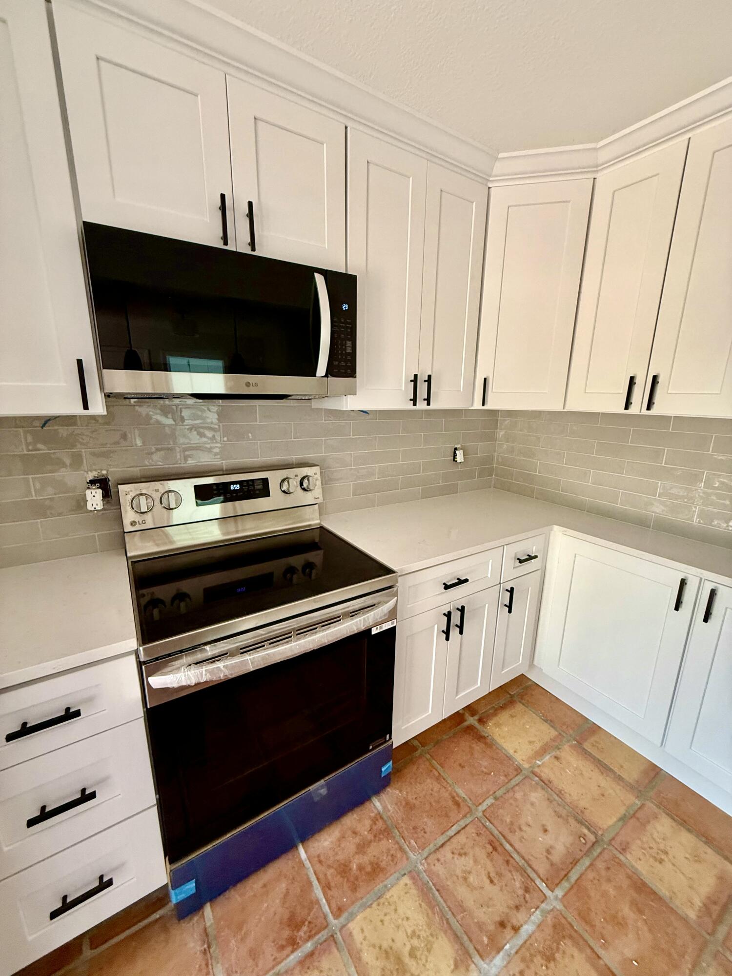 2431 24th Court Jupiter, FL 33477 - Photo 3 of 14 New appliances