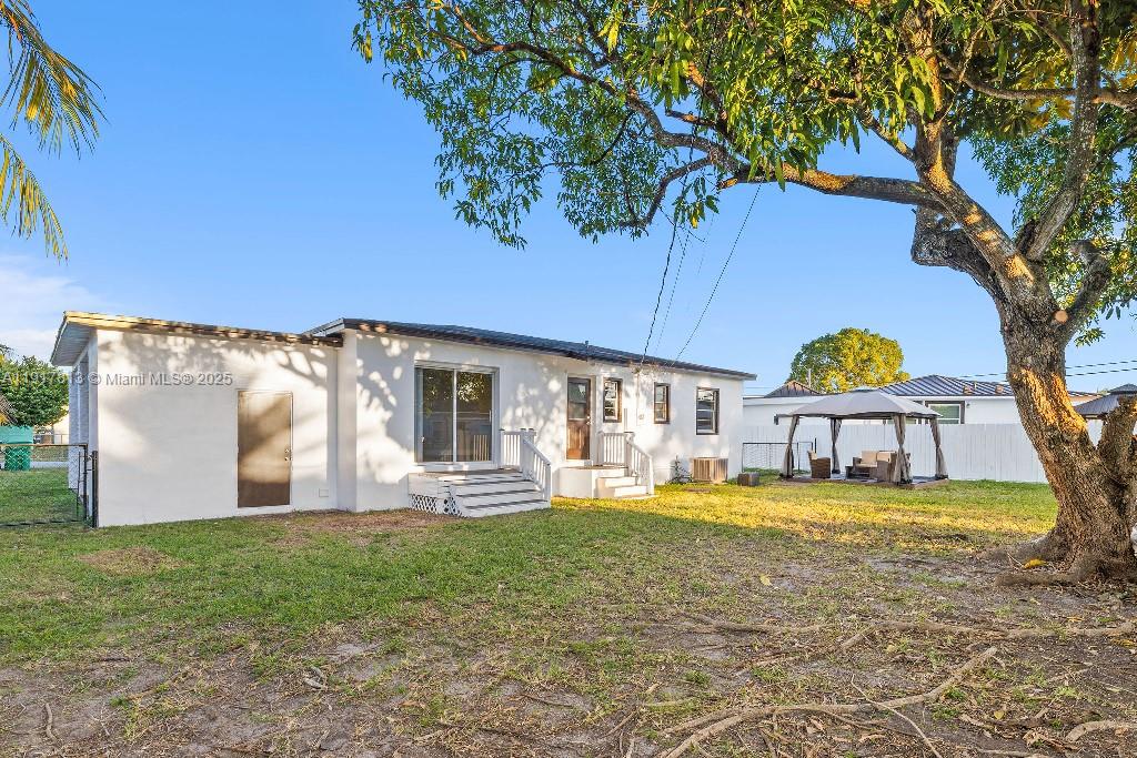 14760 Fillmore Street Miami, FL 33176 - Photo 20 of 23 a front view of a house with garden