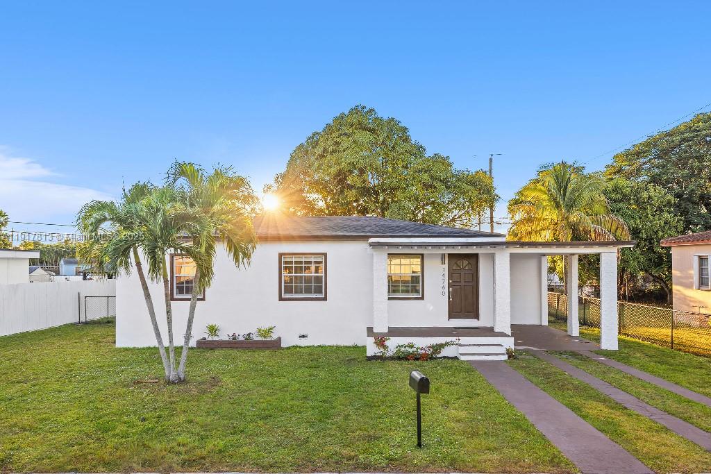 14760 Fillmore Street Miami, FL 33176 - Photo 5 of 23 a house view with a garden space