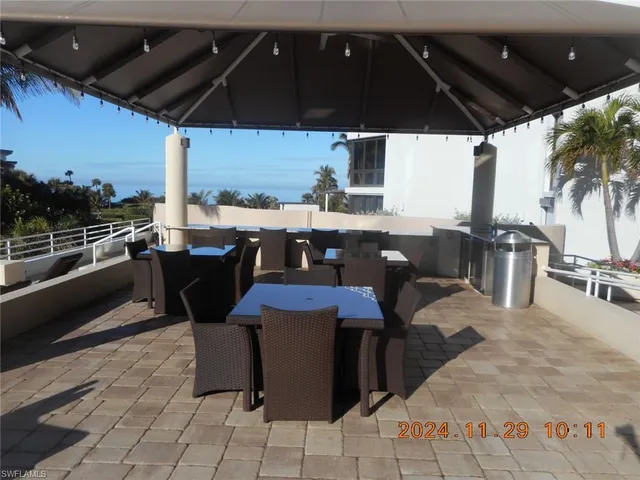 a view of a swimming pool with a yard