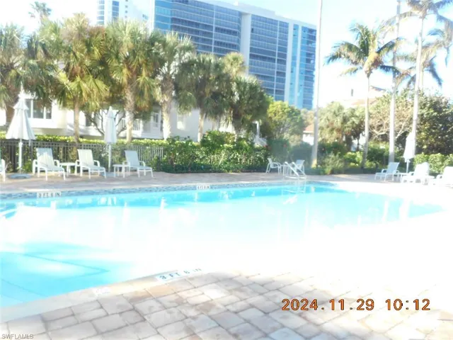 a view of balcony with wooden floor