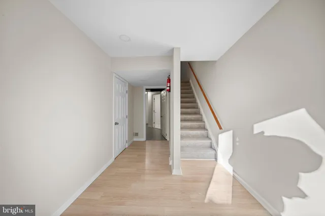 a view of a hallway with staircase