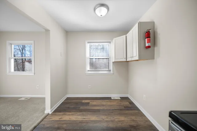 a view of an empty room and window