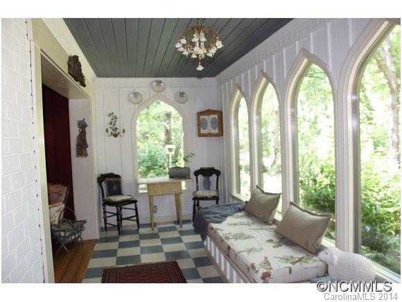 105 Hunting Country Road Tryon, NC 28782 - Photo 6 of 16 a living room with furniture and a large window