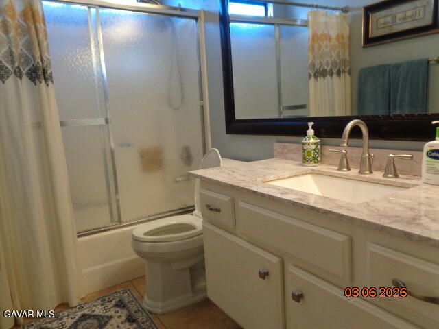 43043 Flag Street Lancaster, CA 93536 - Photo 18 of 29 a bathroom with a granite countertop sink toilet and shower