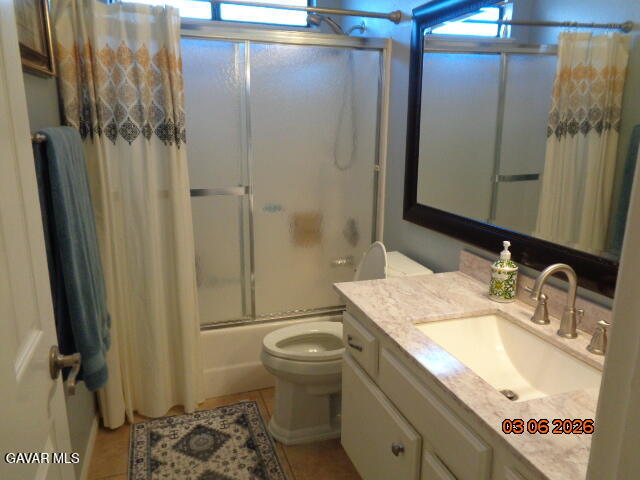 43043 Flag Street Lancaster, CA 93536 - Photo 19 of 29 a bathroom with a granite countertop sink toilet and shower