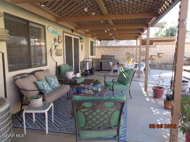 43043 Flag Street Lancaster, CA 93536 - Photo 2 of 29 a outdoor space with lots of furniture and windows