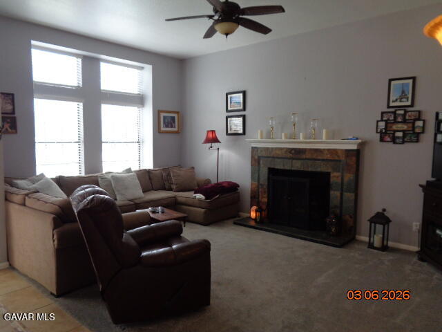 43043 Flag Street Lancaster, CA 93536 - Photo 24 of 29 a living room with furniture and a fireplace