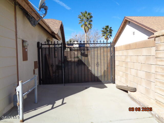 43043 Flag Street Lancaster, CA 93536 - Photo 3 of 29 a view of a wooden door
