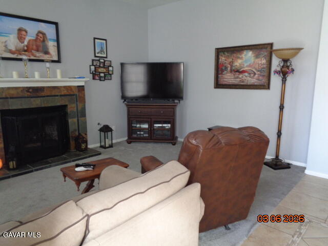 43043 Flag Street Lancaster, CA 93536 - Photo 5 of 29 a living room with furniture and a flat screen tv