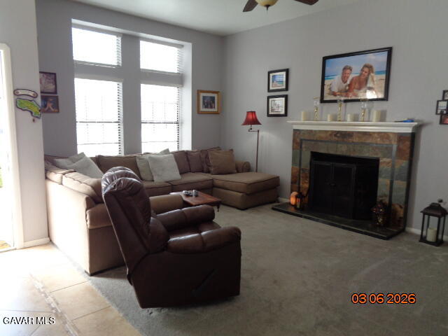 43043 Flag Street Lancaster, CA 93536 - Photo 6 of 29 a living room with furniture window and a fireplace