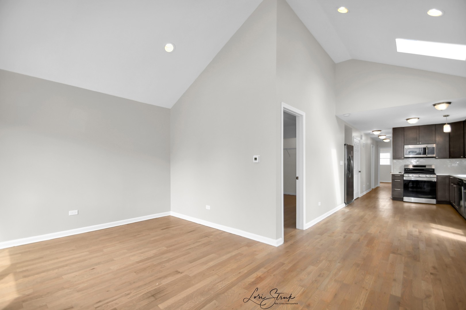 5525 South Emerald Avenue Chicago, IL 60621 - Photo 5 of 29 a view of a livingroom with a kitchen