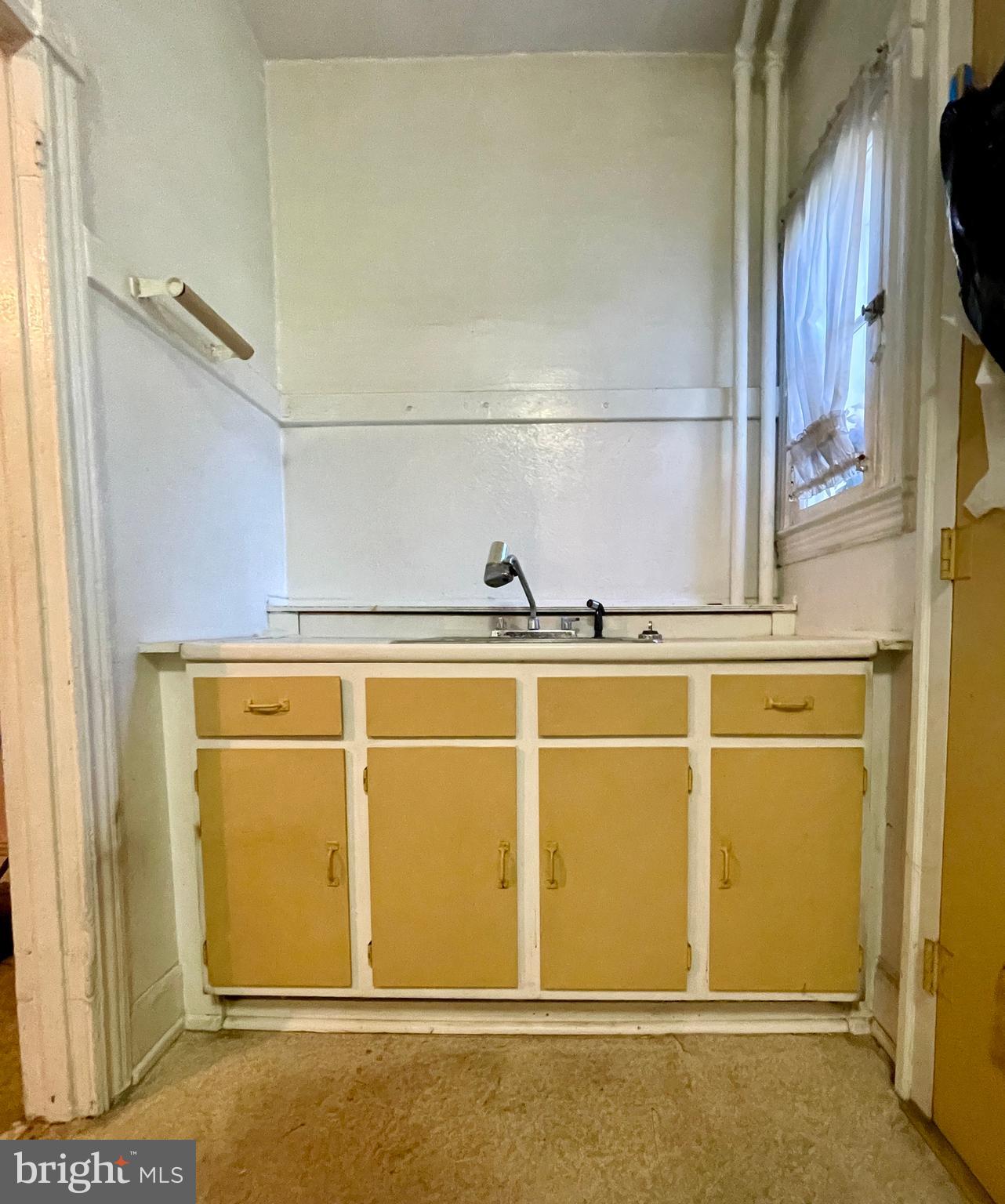 208 North 63rd Street Philadelphia, PA 19139 - Photo 16 of 29 a view of a garage with wooden floor