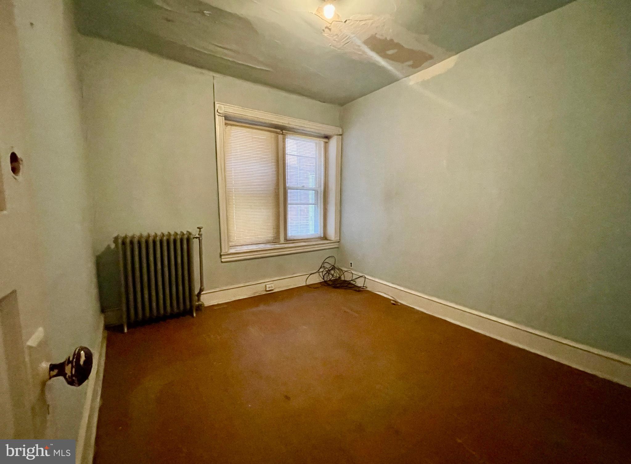208 North 63rd Street Philadelphia, PA 19139 - Photo 10 of 29 an empty room with windows