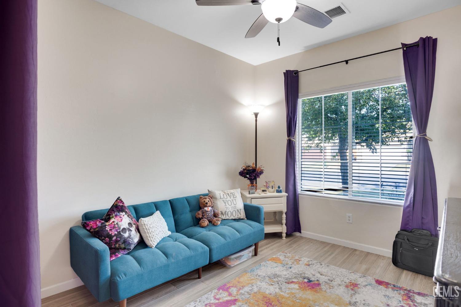 Undisclosed Address Bakersfield, CA 93312 - Photo 28 of 45 a living room with furniture and a window