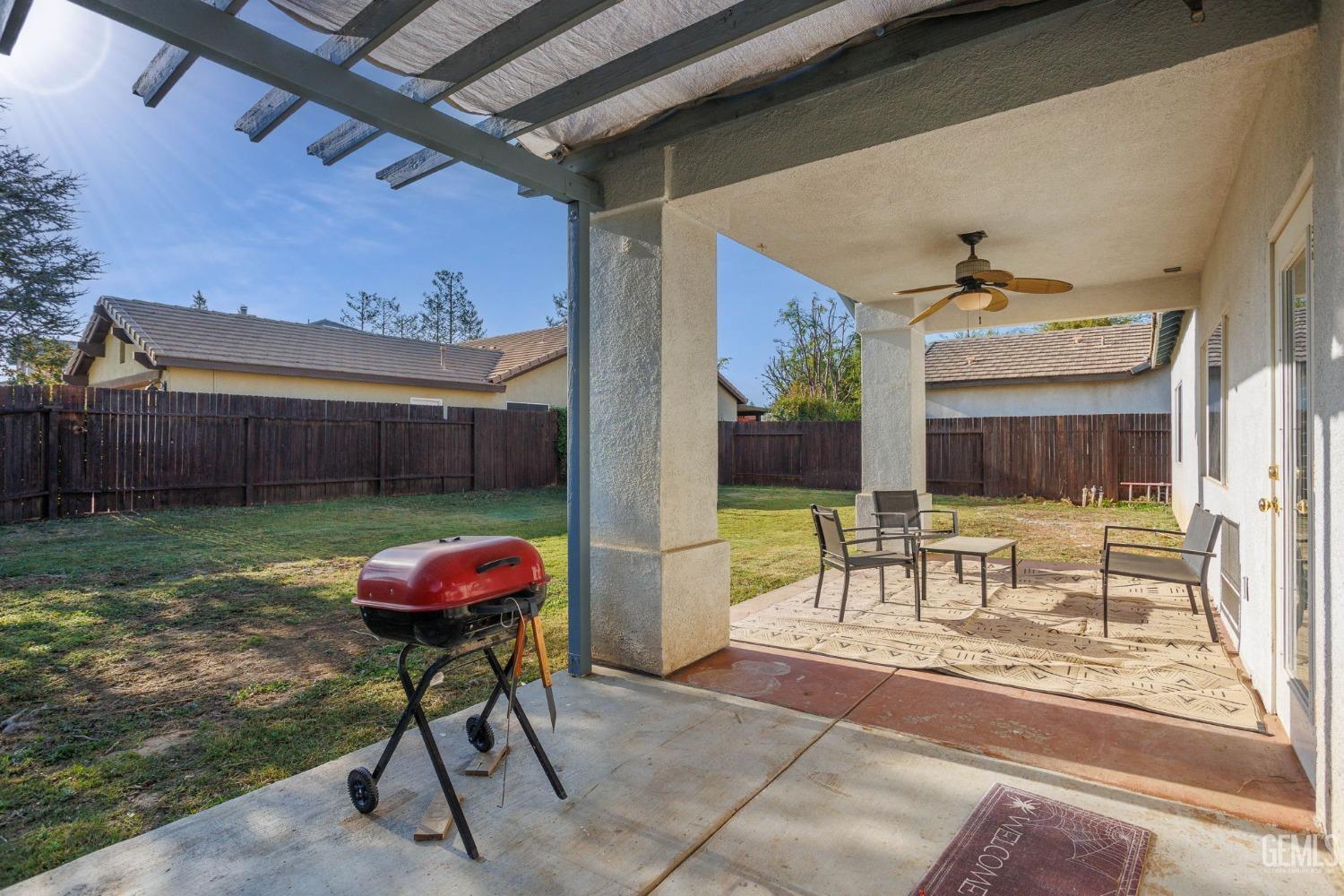 Undisclosed Address Bakersfield, CA 93312 - Photo 37 of 45 a view of a porch with furniture and a yard