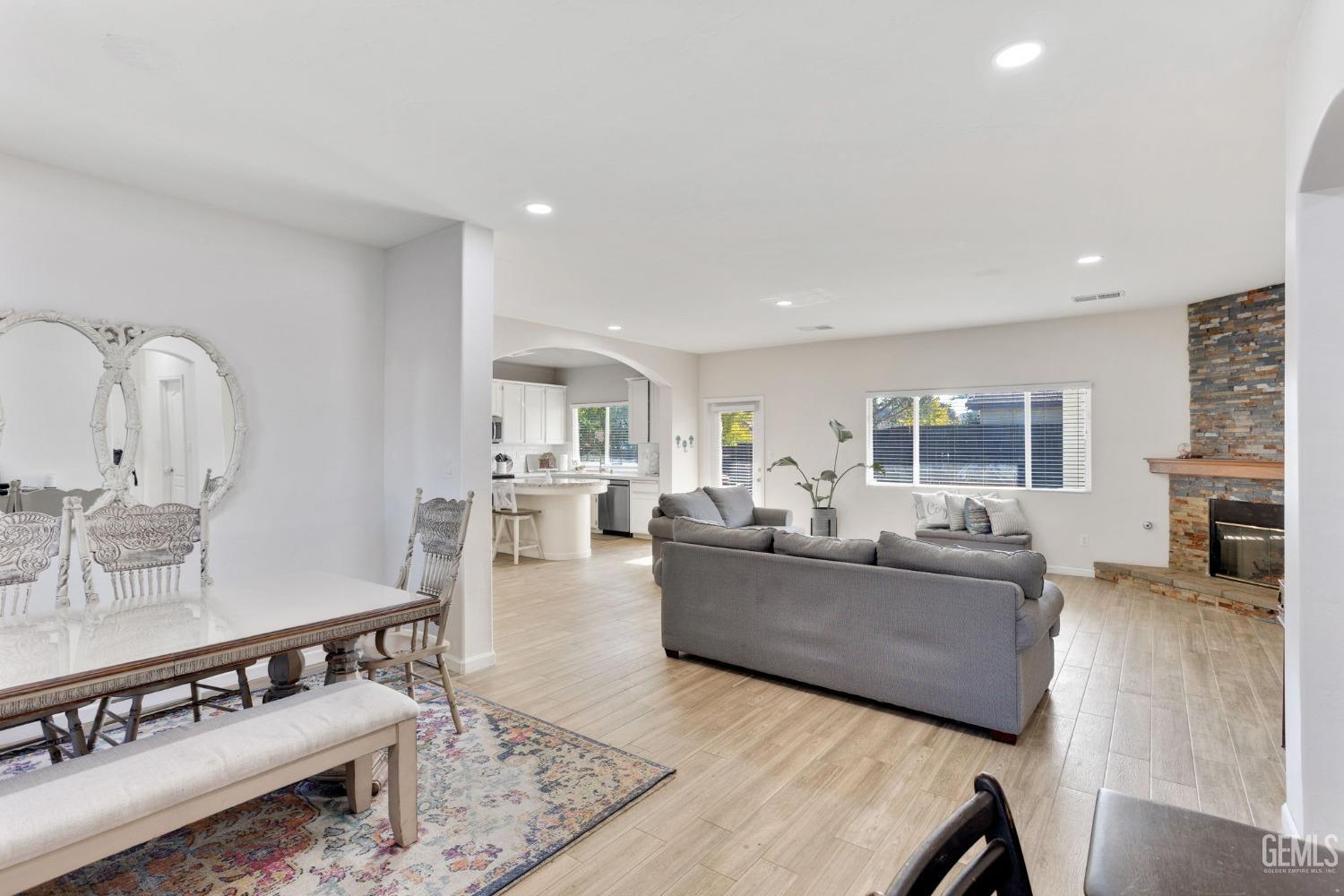 Undisclosed Address Bakersfield, CA 93312 - Photo 8 of 45 a living room with furniture and wooden floor