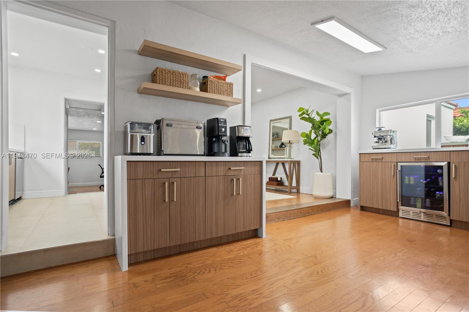 2498 Southwest 19th Terrace Miami, FL 33145 - Photo 13 of 25 a view of a kitchen with furniture and an empty room