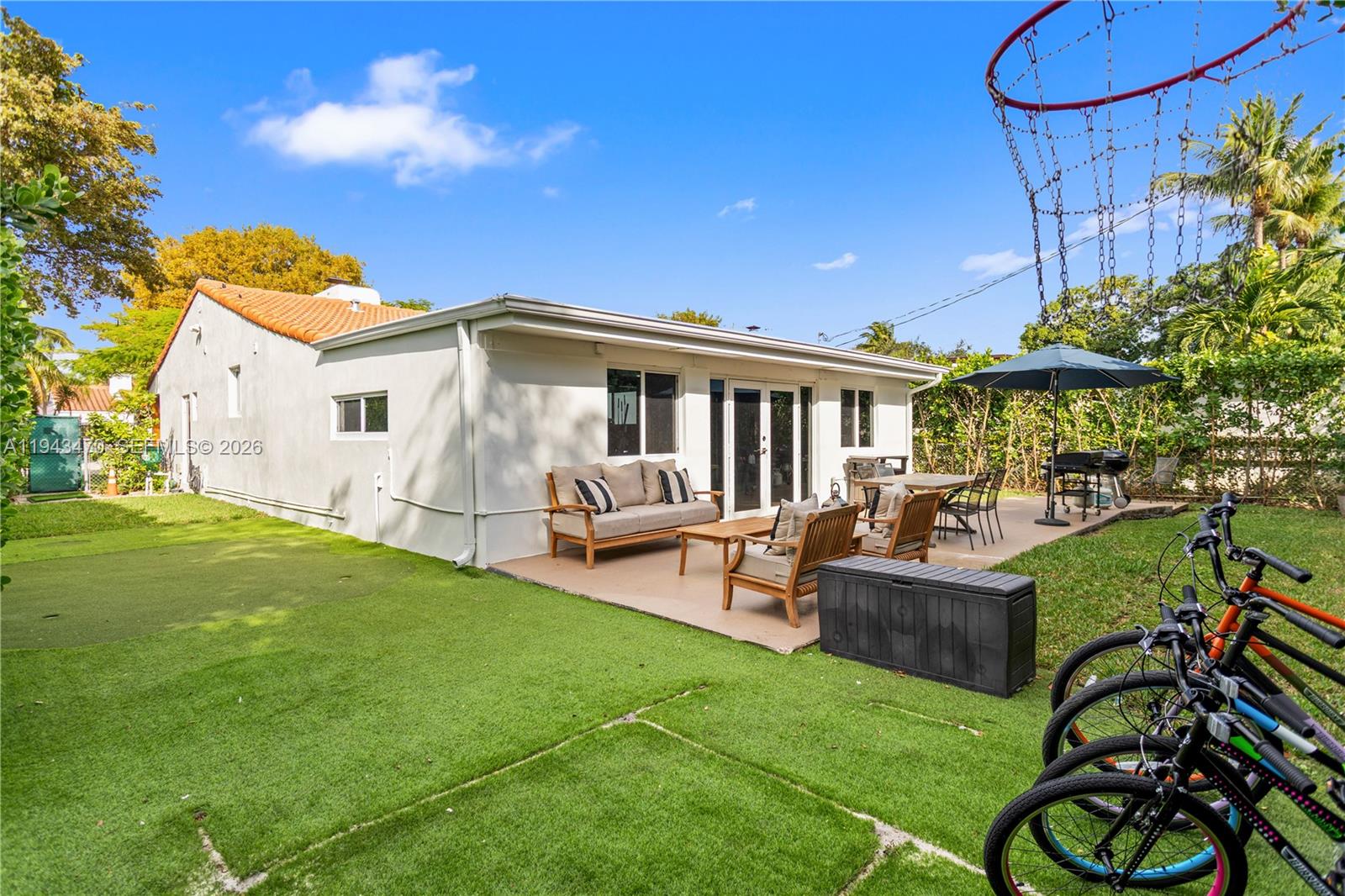 2498 Southwest 19th Terrace Miami, FL 33145 - Photo 23 of 25 a view of a house with backyard and sitting area
