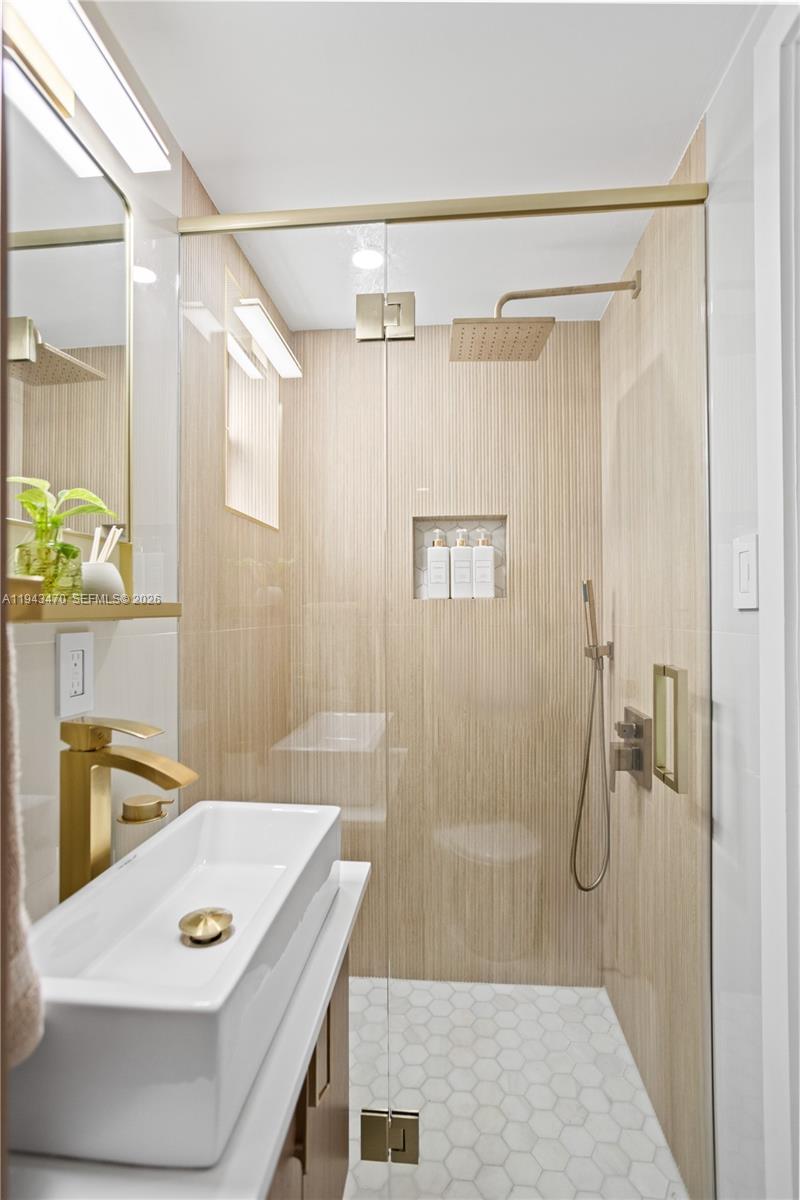 2498 Southwest 19th Terrace Miami, FL 33145 - Photo 10 of 25 a bathroom with a shower and a sink