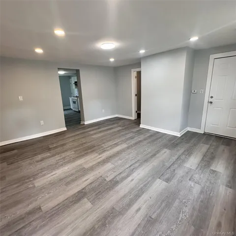 a view of an empty room and window